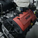 A Ford V8 Engine with the coil-over back on after installing the Metal Horse Ford Coyote Valve Cover Breather Fitting