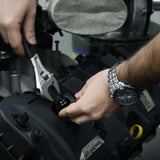 Screwing the Metal Horse Ford Coyote Valve Cover Breather Fitting to place tightly in a Mustang V8 engine